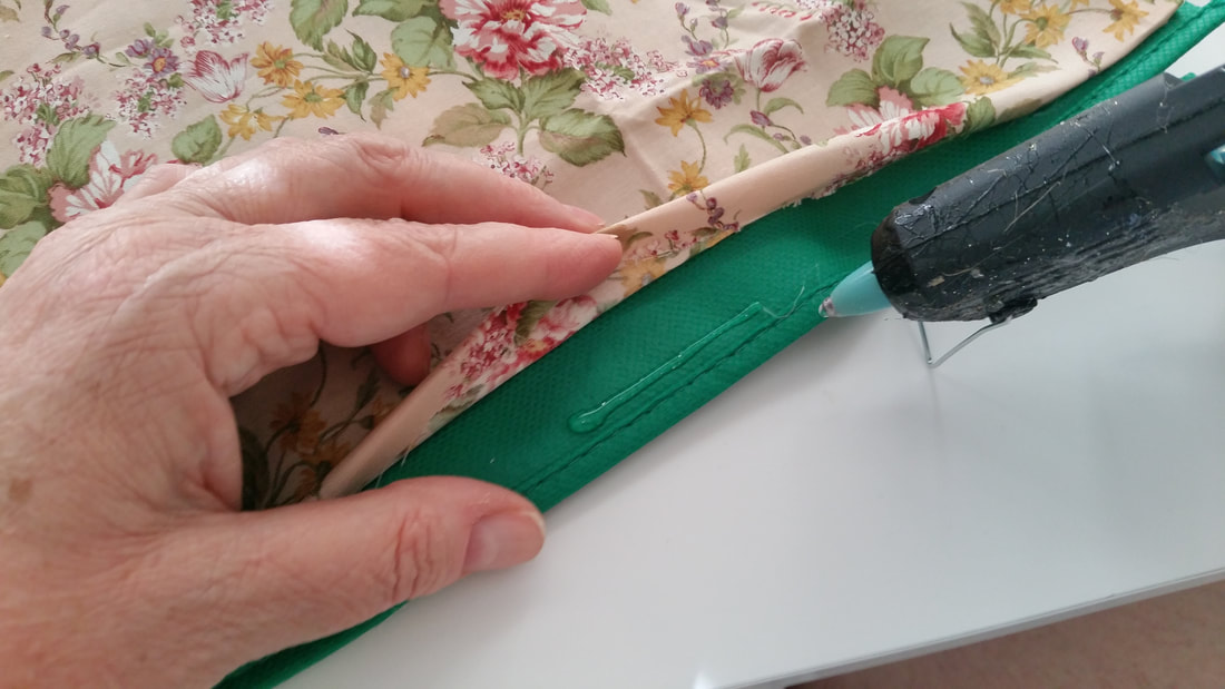 Gluing fabric onto bag side